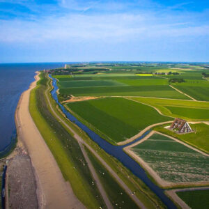 Dutch farm house near the wadden sea, drone picture