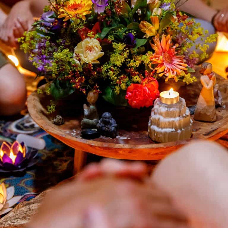 Group circle with Flowers and candles in centre