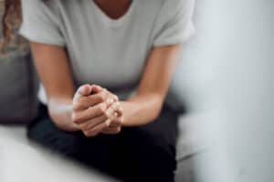 person sitting in therapy