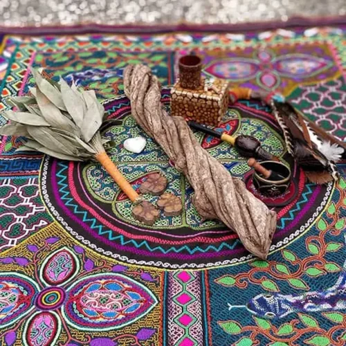 Ayahuasca retreat altar with traditional tools