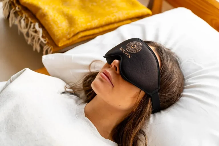 Woman laying with Rejuvyn blindfold during Psilocybin Retreat